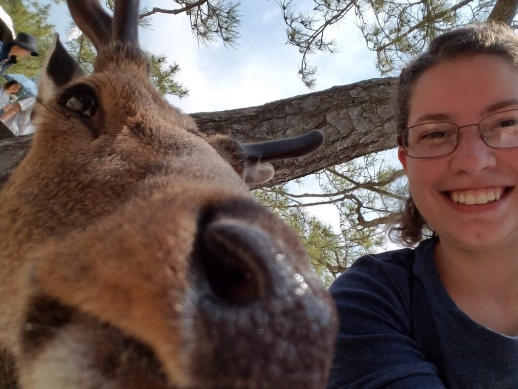 Image of Julianna and animal