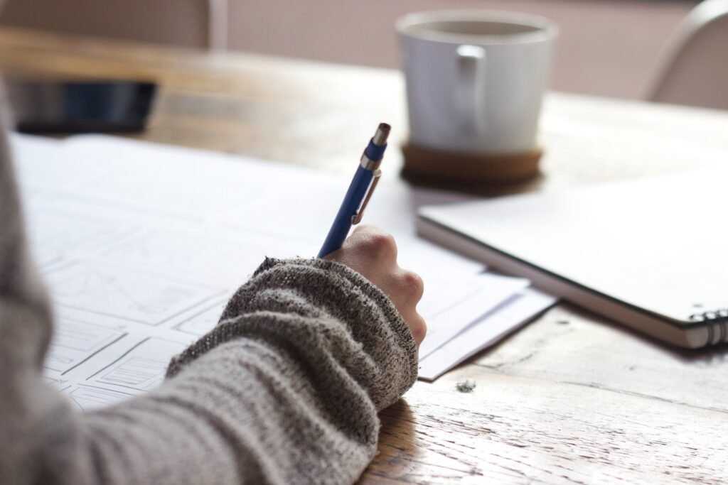 Hand writing a letter